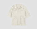 OLAF Logo Knit Polo Off-White heren gebreide polo met face logo en relaxed fit